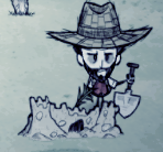 Wilson derrière un château de sable ayant dépassé 1 journée