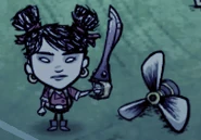 Walani đứng cạnh Cánh Quạt Săt next to an Iron Wind