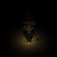 Wilson en hiver portant un Bonnet d'hiver. Eclairé par une pierre chauffante