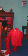 Red Guy crawling behind the scenes.