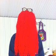 Red Guy with glasses.