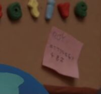 A post it with "Roy" and a number on it.