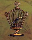 Tukan w klatce na ptaki
