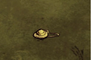 Amulet Magiluminescencji leżący na ziemi