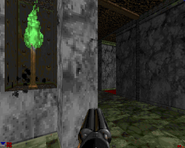 Press on the green torch to reveal a teleporter leading to a secret room.