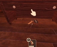 A key under a drawer.