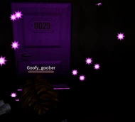The Subspace Tripmine door emitting pink stars.