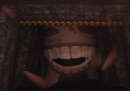 Queen grumble gate.png (980 KB) The Queen Grumble behind the left gate.