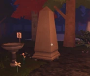 Fake monument hiding.jpeg (161 KB) A fake monument after moving (it's on the path and not on the grass).