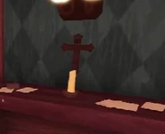 CandleAndCrucifix.png (52 KB) A Crucifix seen right above a Candle.