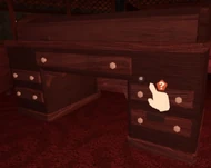 Lighterpeeking.jpg (87 KB) The top of the lighter after closing a container from an office desk.