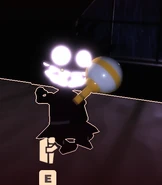 Sally holding a Holy Hand Grenade.