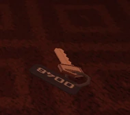 A key on the carpet.