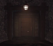 A sewer door with a wooden door frame from The Mines.