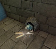 Louie near the exit of The Dam, thinking about taking the Shears that the Player dropped.