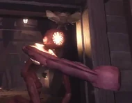 The Figure eating a Gloombat.