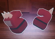 The Boxing Gloves on the ground.