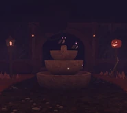 A group of Bat Caws at a fountain, in front of The Greenhouse entrance.