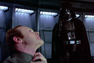 Vader attacks a Moff