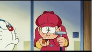 Nobita trying to use Accurate Pipe from Homles' Tools