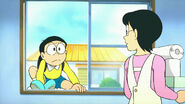 Nobita jumping through a window to get into his house.