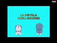 An Italian Doraemon title card. The background is changed to an icy blue color.