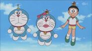 Parallel World Nobita (right) in the actual world Nobita's clothes