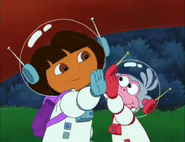 All suited up and ready for liftoff! They slap a high-five.