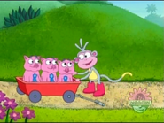 (Boots puts Oinky in the wagon with his friends.)