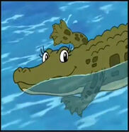 A crocodile swimming with flippy flippers