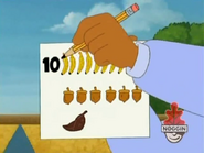 Papi gets out a pencil to write the number of each ingredient, just in case Dora forgets. So, ten bananas.