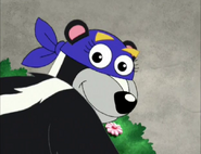 (Sacre bleu! She has a blue mask and gloves, JUST like Swiper!)