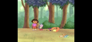 Dora and Boots saw Swiper sleeping on the ground.