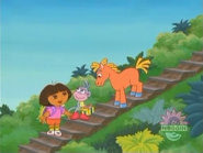 Dora explains to Boots what the horse said. "Caballíto says he's sorry. He didn't know your cake was on the step."