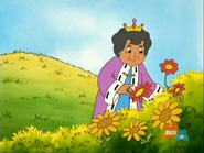 As she looks at flowers, Dora and Boots come.