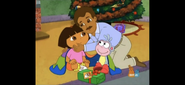 "Feliz Navidad, Dora," said Papi.