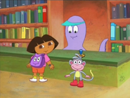 She sure does! Do you remember WHERE Dora put the books? In Backpack! Say, "Backpack" (one more time)!