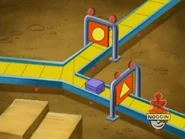¡Rápido! Which conveyor belt is the present on? Circulo or triángulo?