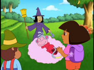 "I put a sleeping spell on that monkey!" Said the witch. (Look, Dora has the star pocket on Backpack)