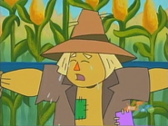 (sobs) Aww, it's alright, Mr. Scarecrow. We know you didn't mean to frighten her.