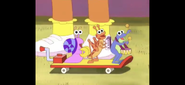 The Fiesta Trio riding a skateboard.