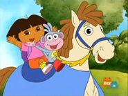 And riding with this monkey is his best friend, a brave and fearless girl named Dora!