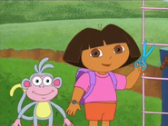 Help Dora and Boots cut through the net.