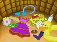 (Look at all those things!) Can you find a bowtie for Boots?