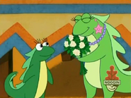 (gives her the flowers) She REALLY likes it!