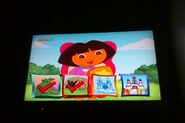 Dora puts check-marks.