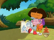 Boots gives Dora a hug.