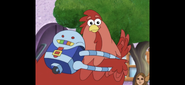 The Big Red Chicken has a robot backpack.