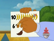 Papi writes a "6" so Dora can remember.