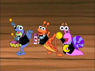 The Fiesta Trio are wearing fancy suits as part of the orchestra.